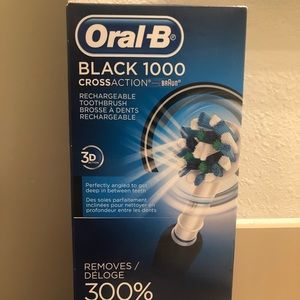 Brand NEW Oral-B black 1000 toothbrush